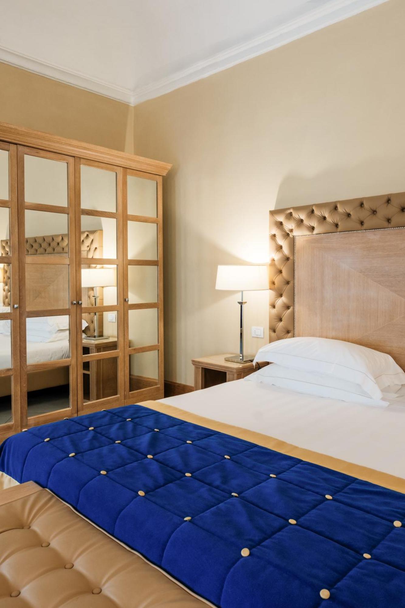 Villa Tolomei Hotel & Resort Florença Exterior foto A bedroom at the hotel