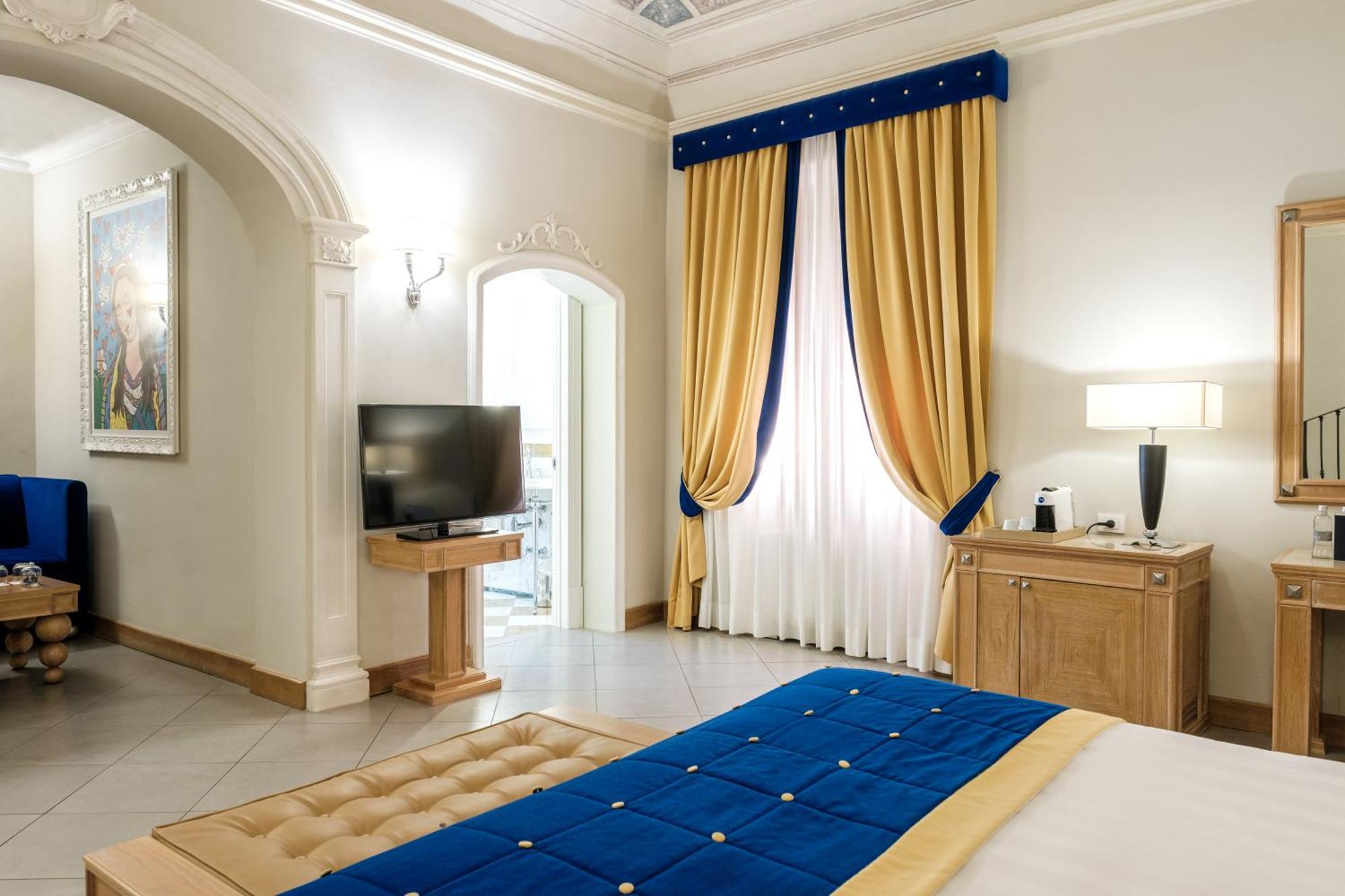 Villa Tolomei Hotel & Resort Florença Exterior foto A bedroom at the hotel