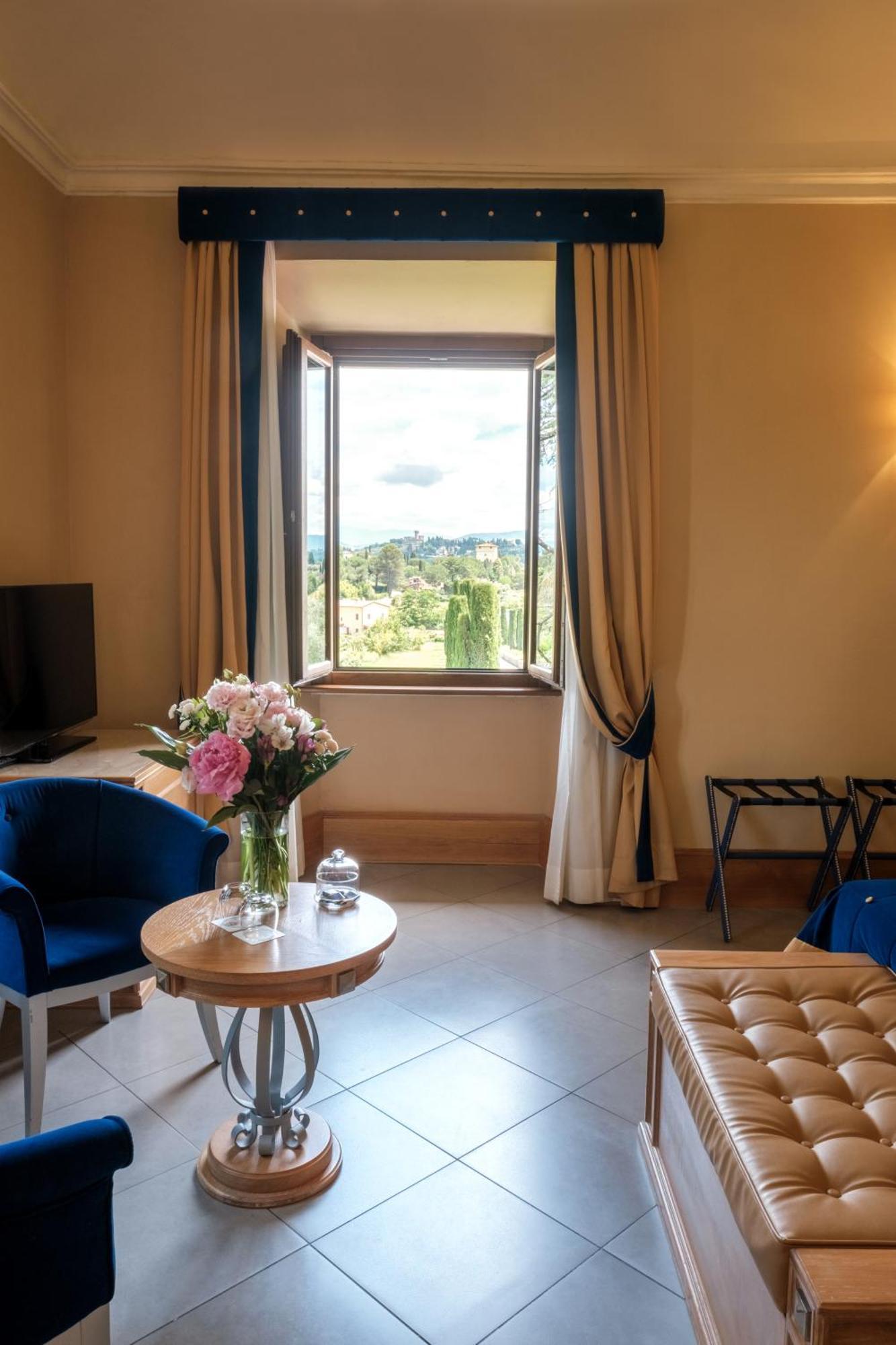 Villa Tolomei Hotel & Resort Florença Exterior foto A room at the hotel