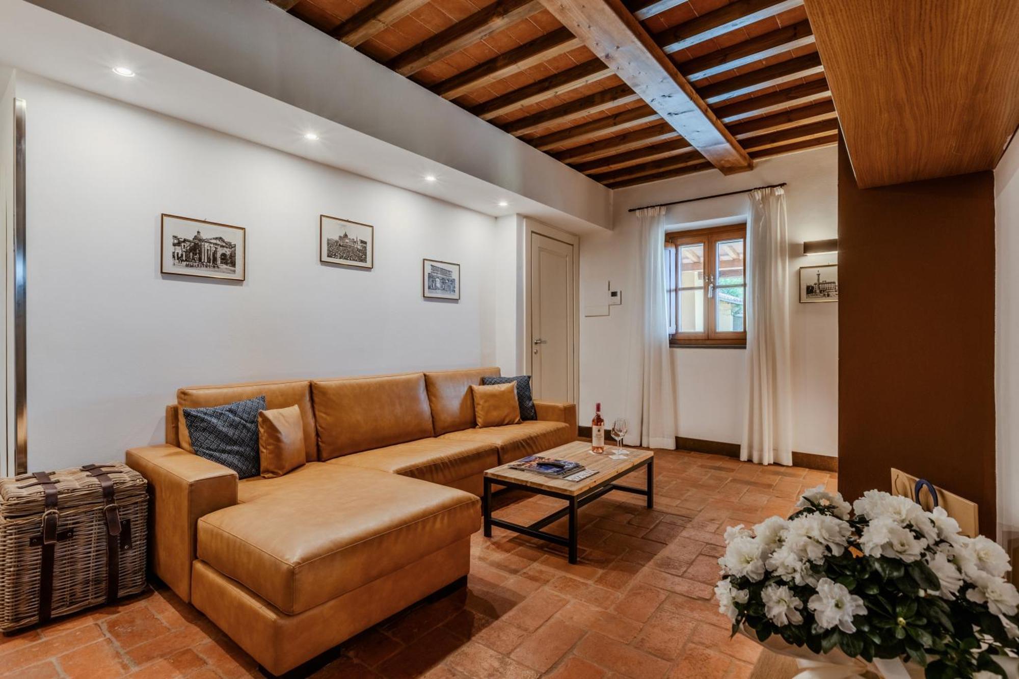 Villa Tolomei Hotel & Resort Florença Exterior foto A living room in a house