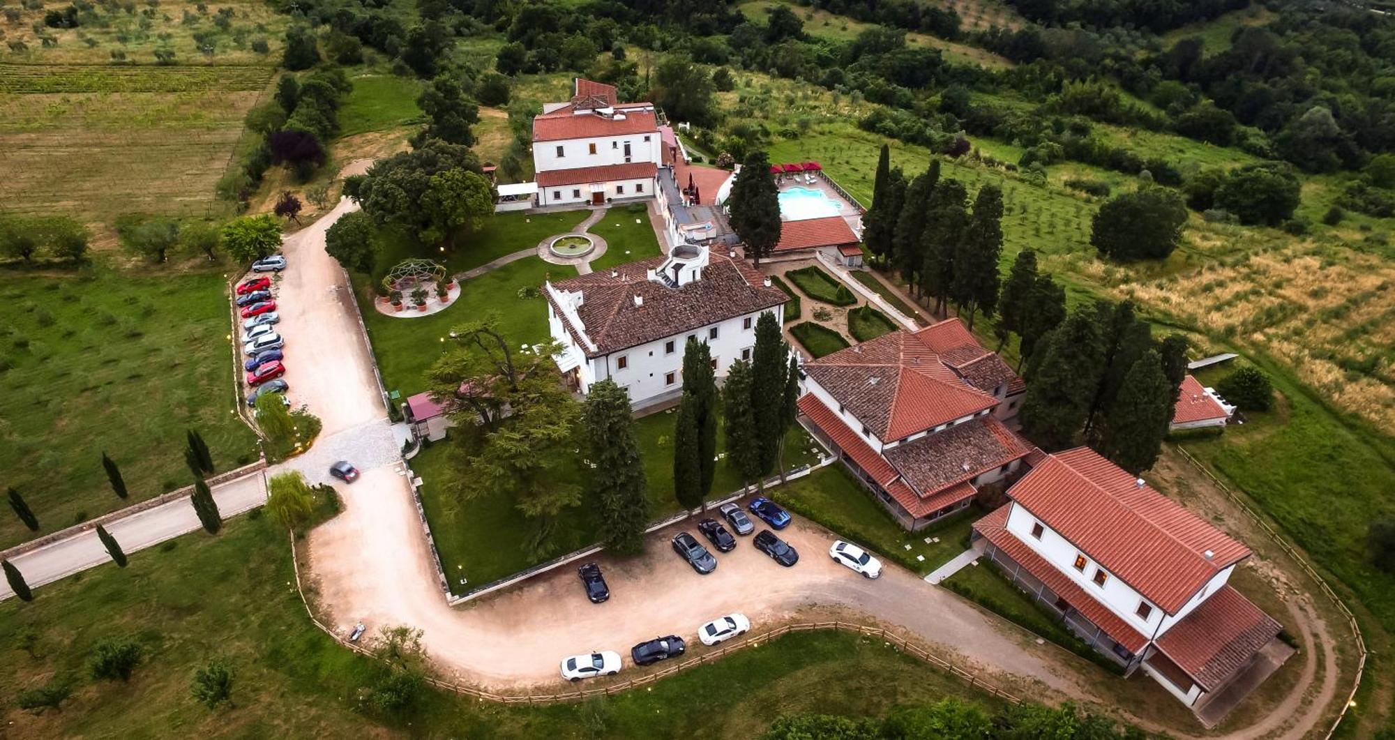 Villa Tolomei Hotel & Resort Florença Exterior foto Aerial view of the monastery